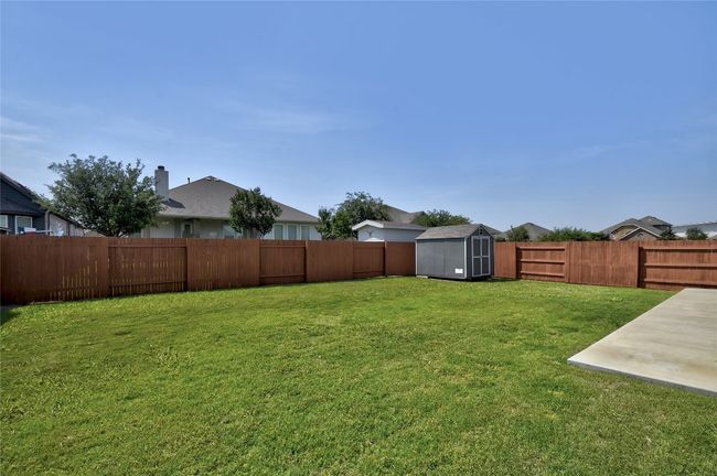 The fence was just freshly stained in May of 2025. | Image 26