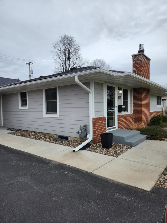 Cement board siding and gutters | Image 18