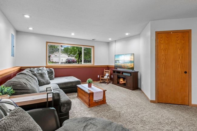 Cozy up in front of your own fireplace this winter while watching your favorite series or movie. This fireplace is a standalone electric fireplace, and will not be staying with the home. | Image 18