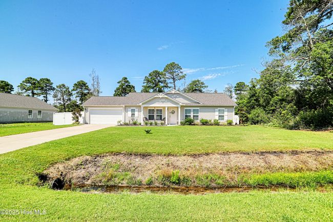 870 Pine Needles Rd, House other with 3 bedrooms, 2 bathrooms and 2 parking in Boiling Spring Lakes NC | Image 4