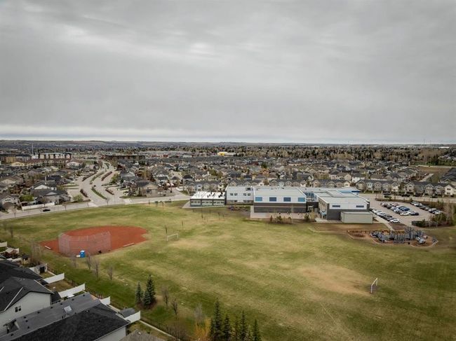 310 Kingsbury View Se, House other with 4 bedrooms, 4 bathrooms and 5 parking in Airdrie AB | Image 47