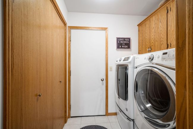 Main-Floor Laundry and Private 2.5-Car Garage Provide Convenience and a Single-Family Feel without the Upkeep! | Image 14