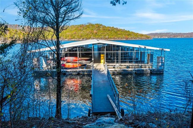 View of dock with a water view and boat lift | Image 62