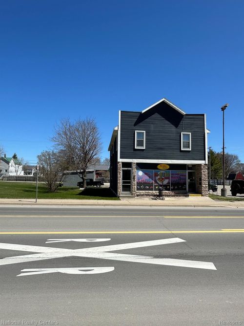 923 W Chisholm St, Alpena, MI, 49707-1719 | Card Image