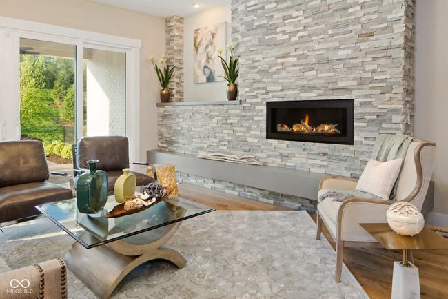 Open-concept family room ideal for relaxing or hosting guests. | Image 4