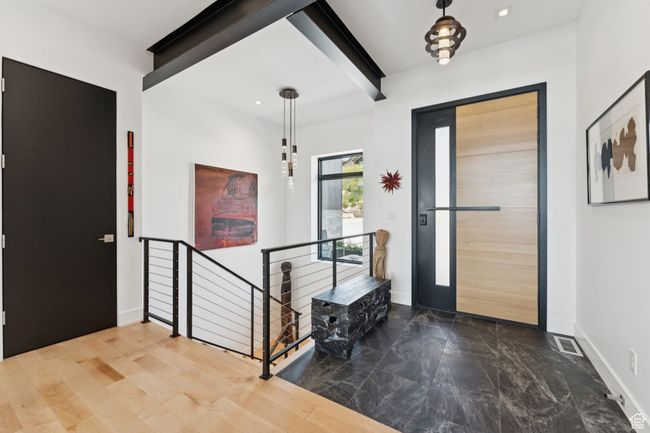 Entrance foyer with marble finish flooring, beam ceiling, and recessed lighting | Image 11