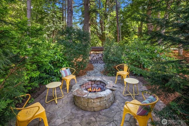 The cozy fire pit for conversation and s'mores under the stars. | Image 34