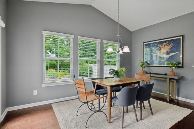 The dining room has ample space for a large dining party. Not only can you seat comfortably at least 8 people there is bartop seating for two as well as countertop seating for two | Image 12