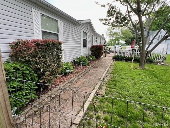 View of fenced side yard | Image 20