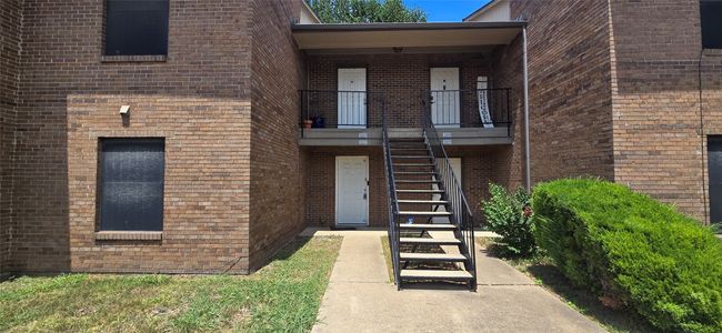 View of building exterior featuring stairway | Image 13
