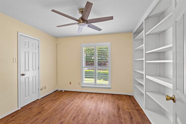 Spare room with wood finished floors and ceiling fan | Image 32