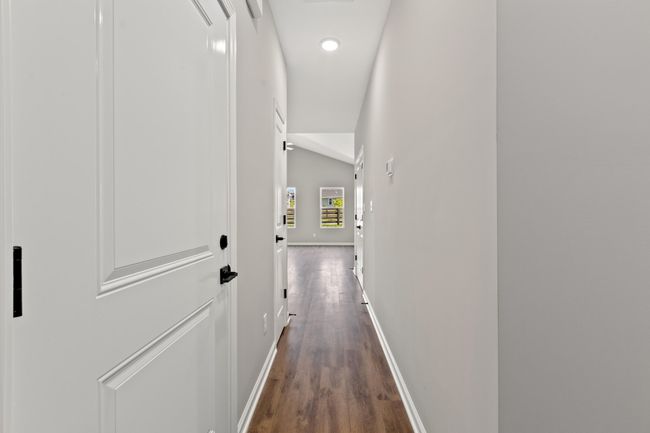 Hallway from front door to living areas. | Image 10