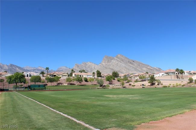 Mountain view with a residential view | Image 32