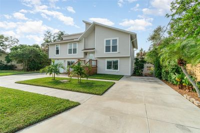 RARE TO FIND, FULLY RENOVATED 4/3 home (easily convertible to a 5/3) offering incredible flexibility for multi-generational living or as a potential income-generating property. | Image 1