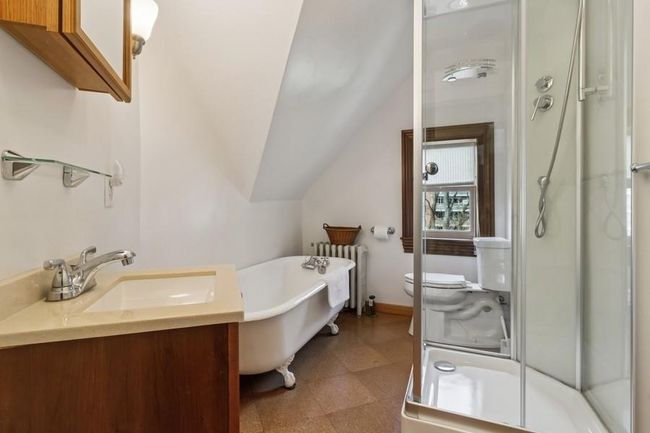 3rd floor bathroom with shower & deep tub | Image 33
