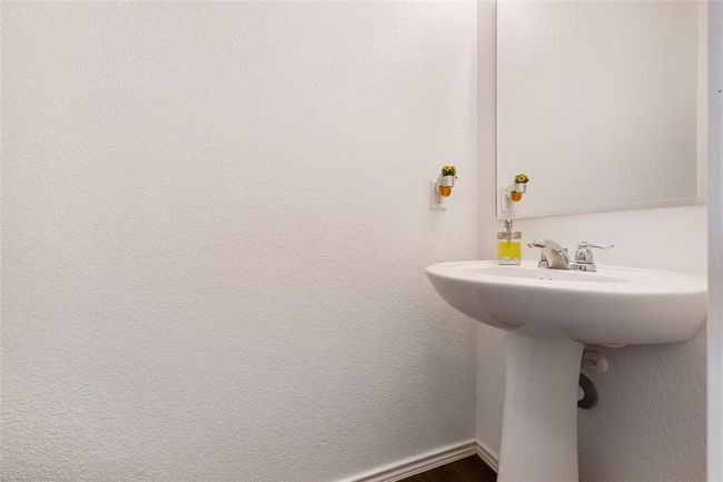Bathroom featuring a sink | Image 28