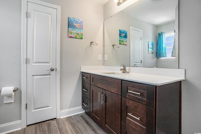 Bathroom featuring vanity and wood finished floors | Image 19