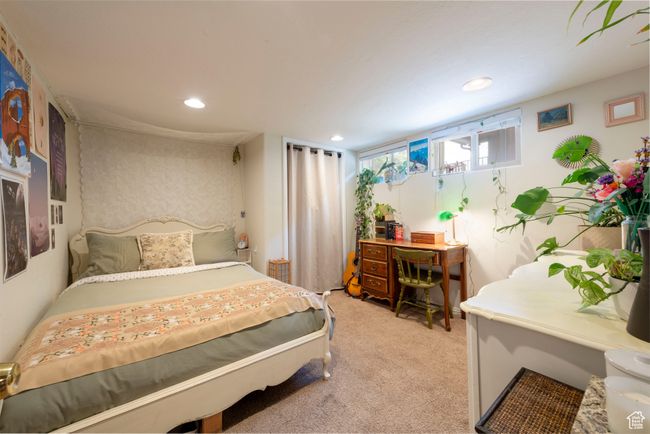 Bedroom with light carpet and recessed lighting | Image 19