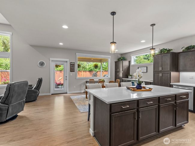The spacious island is perfect for entertaining. | Image 11