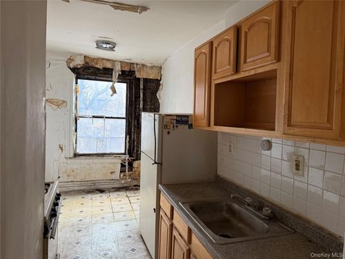 34 70th St, Jackson Heights, NY, 11372-1056 | Card Image