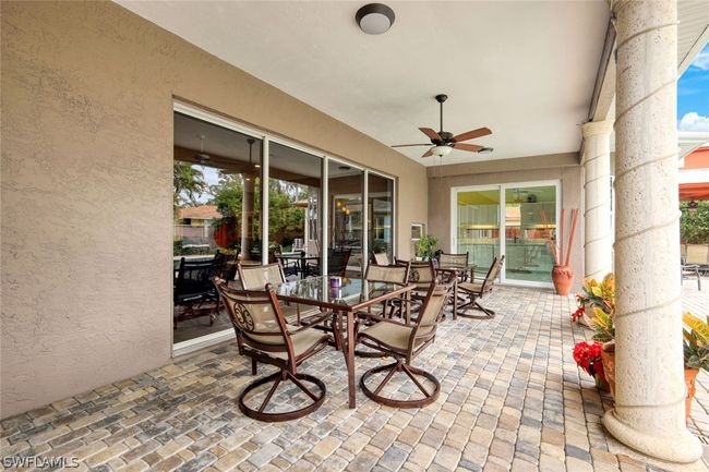 View of patio / terrace featuring ceiling fan | Image 13