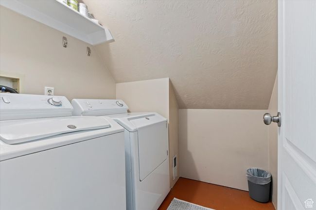 Laundry area featuring independent washer and dryer | Image 21