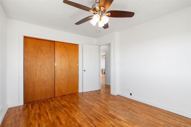 Warm wood flooring for a welcoming touch. | Image 48