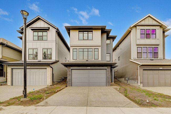 29 Shawnee Green Sw, Home with 3 bedrooms, 2 bathrooms and 4 parking in Calgary AB | Image 1
