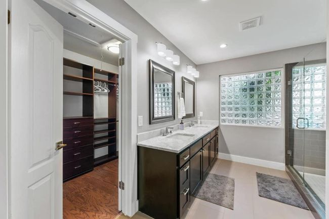 Full bath featuring double vanity | Image 23