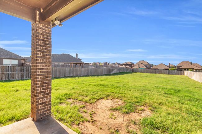 View of yard with a residential view | Image 30