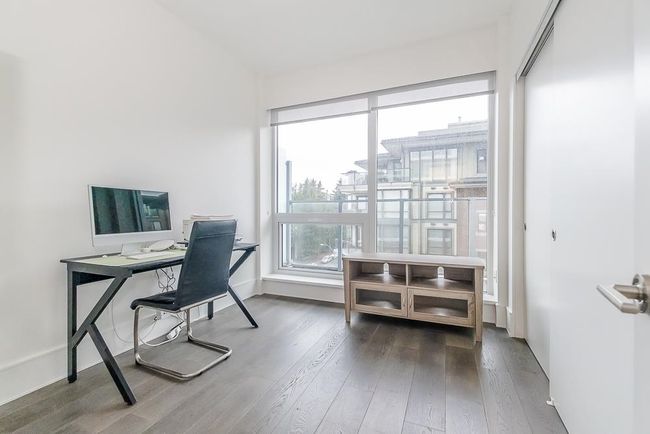 Office with wood finished floors | Image 23