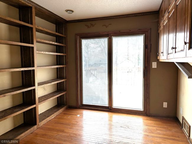 Den with sliding doors to back deck | Image 19