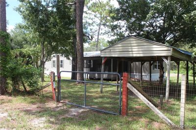 6909 W Polaris Court, House other with 3 bedrooms, 2 bathrooms and 1 parking in Homosassa FL | Image 1