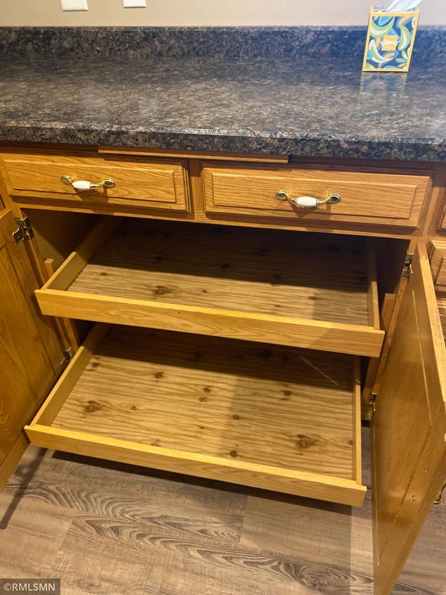 Handy pull out drawers in kitchen | Image 18