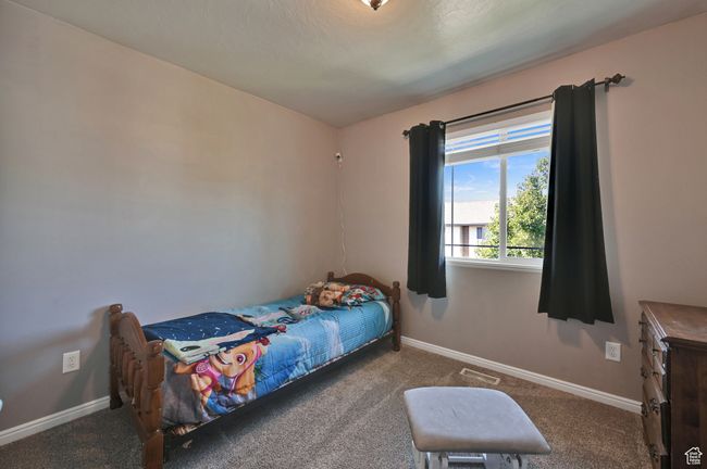 Bedroom featuring carpet | Image 20