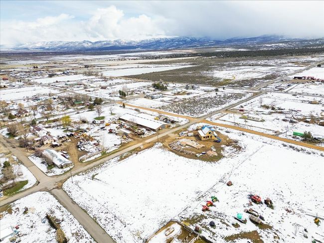 Snowy aerial view with a mountain view | Image 11