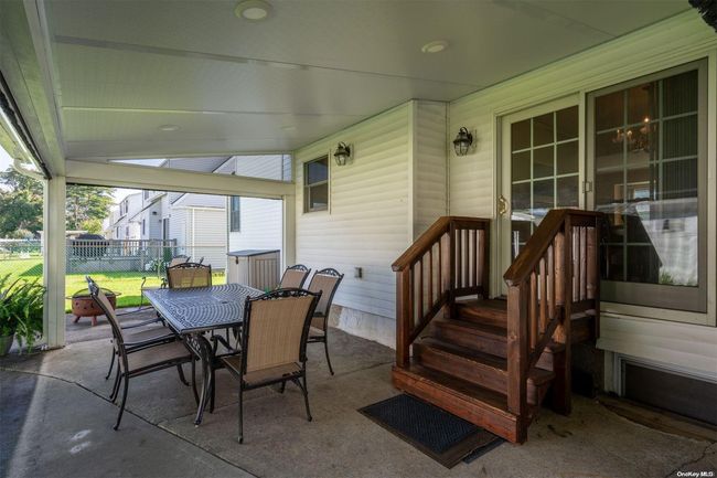 Covered patio with Four Seasons Life Room | Image 21