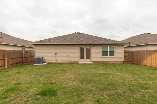 Back of house featuring central AC | Image 23