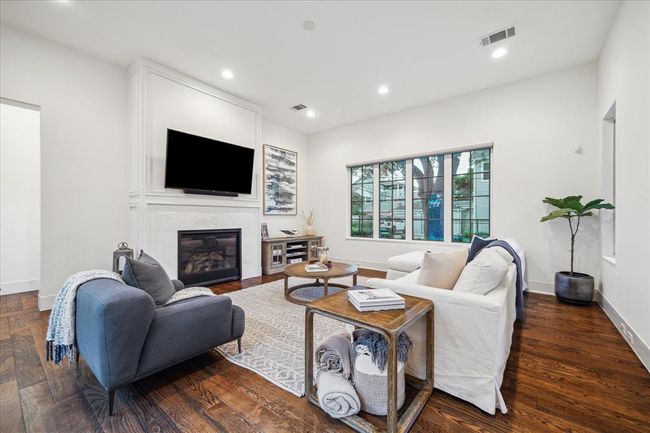 FAMILY ROOM. Located at the back of the home with doors out onto the pool garden and sliding doors out onto the kitchen garden/deck. This home was purposly designed with seamless indoor outdoor living in mind. | Image 12