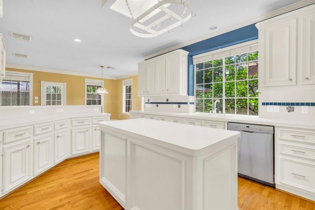 Coming from the entry to the kitchen. Large kitchen with plenty of countertop space. | Image 8