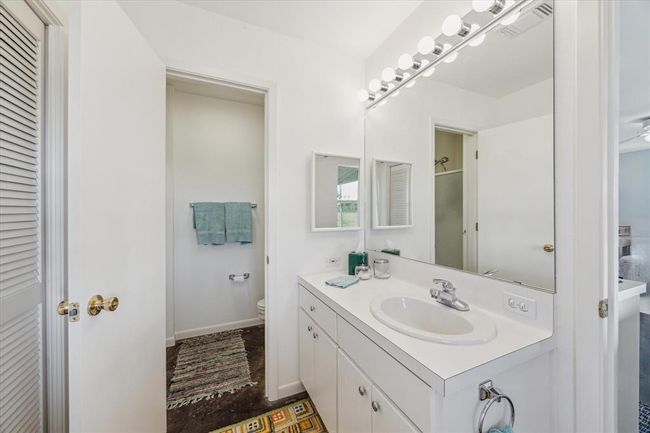 Bathroom and vanity area of the garage suite. | Image 24