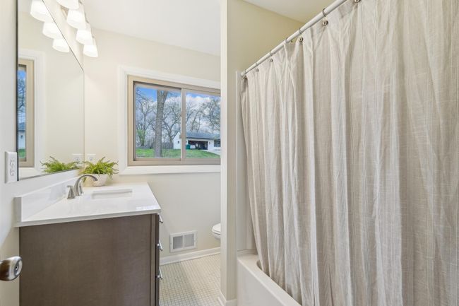 Main level refreshed full bath. | Image 11