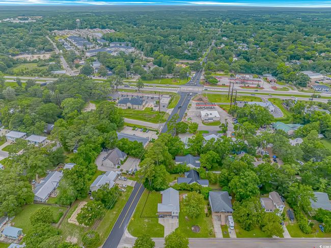 Aerial view of property's location featuring nearby suburban area | Image 38