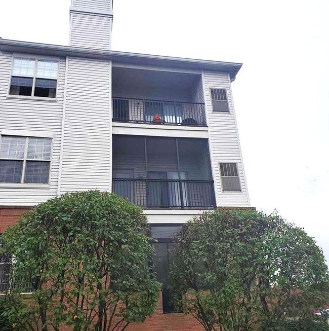 Second Floor End Unit, Elevator Screen in Balcony | Image 34