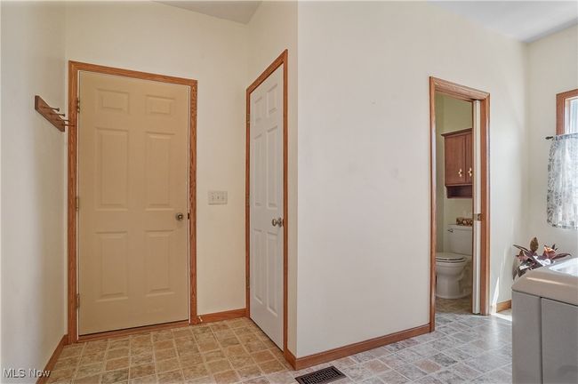 Hall featuring visible vents and baseboards | Image 38