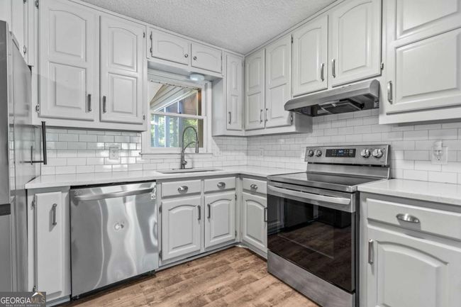 4617 Kingswood Dr, House other with 3 bedrooms, 2 bathrooms and 2 parking in Flowery Branch GA | Image 12