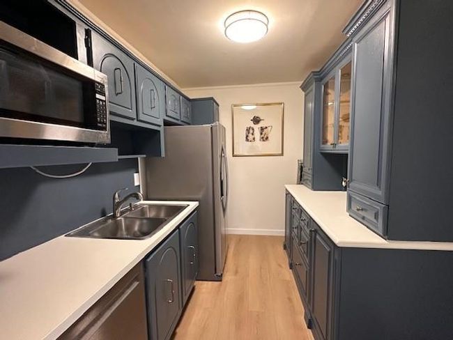 Galley Kitchen Freshly Updated Stainless Appliances | Image 16