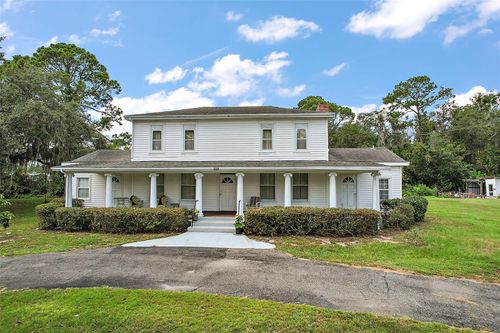 13325 Woodland Dr, ASTATULA, FL, 34705-9517 | Card Image