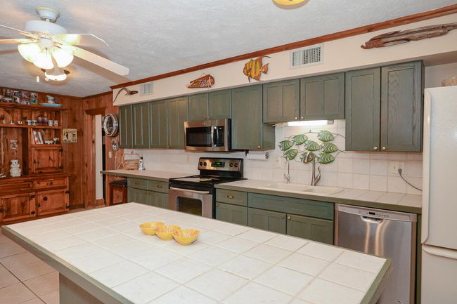 576 Sw Rustic Cir, House other with 3 bedrooms, 2 bathrooms and null parking in Stuart FL | Image 10