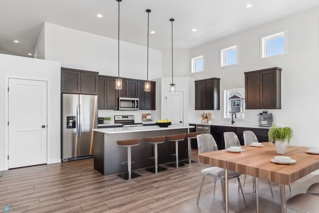 Virtually Staged Kitchen and Dining Room | Image 9